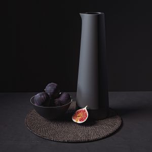 Black Tableware And Figs On Placemat