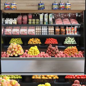 Showcase At The Market With Vegetables And Fruits