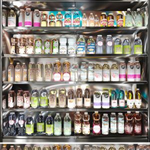 Refrigerator With Lemonade In The Supermarket