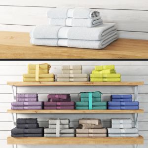 Set Of Colorful Towels On A Shelf