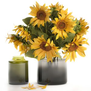 Bouquet Of Yellow Sunflowers In A Glass Vase