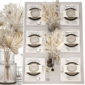 Table Setting With A Bouquet Of Dried Flowers